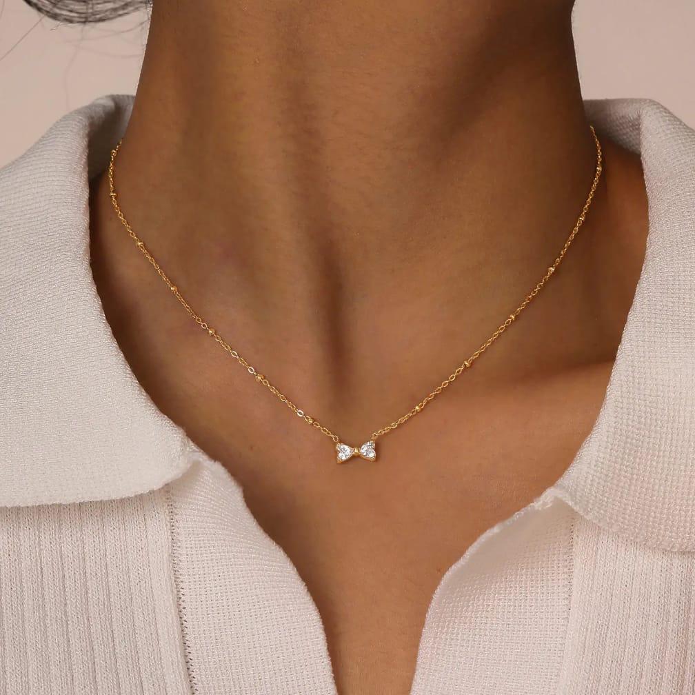 WhatsApp Image 2026-02-18 at 4.11.30 AM (17) Minimalist Bow Necklace - Image 1